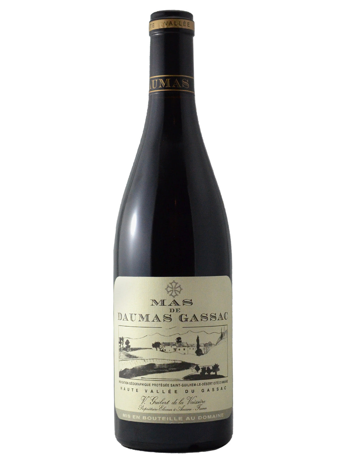 A bottle of Mas de Daumas Gassac red wine with a pale straw coloured label displaying the brand and vintage. Label features an ink drawing of vineyards, trees and a distant chateau. Dark enclosure with gold details. All set against white background.