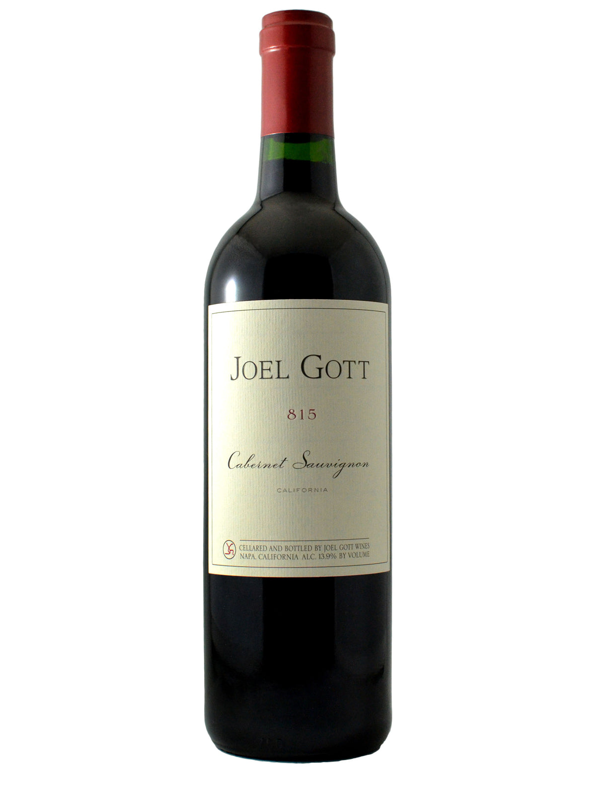 A bottle of Joel Gott 815 Cabernet Sauvignon wine with a red cap and label, indicating it is a product of California.