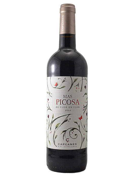 Wine bottle with a decorative label featuring floral designs and the wine name/producer/vintage on a white background. Rose gold coloured enclosure.