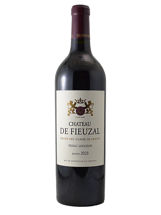 A bottle of Chateau de Fieuzal 2023 red wine, featuring a dark glass bottle with a cream-colored label and a dark burgundy capsule, set against a plain white background.