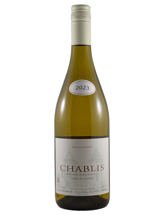 A bottle of Chablis white wine from Gerard Tremblay, featuring a green-brown glass bottle, a white screw cap, a white '2023' vintage sticker on the shoulder, and a white label with 'CHABLIS' printed in red. Bottle is set against a plain white background.