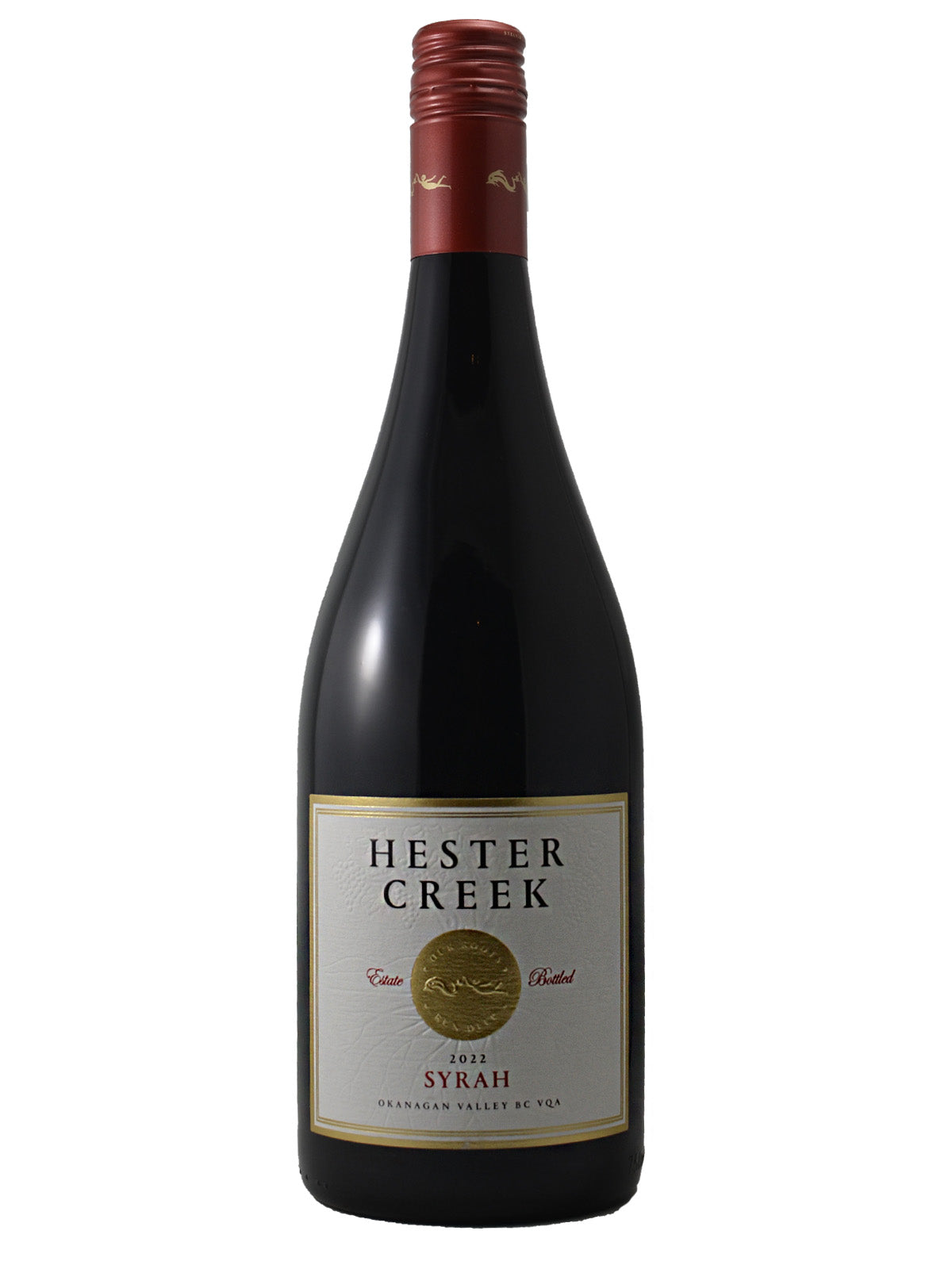 Hester Creek Syrah wine bottle on a white background. Gold medallion bordered by the words 'Estate Bottled'. Vintage 2022, Okanagan Valley BC VQA. Red screw cap enclosure.