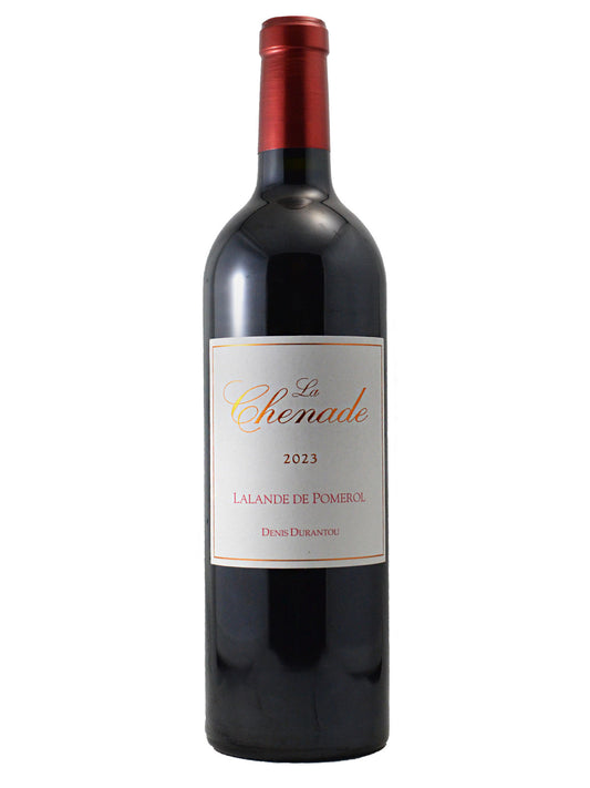A bottle of La Chenade 2023 Lalande de Pomerol red wine, featuring a dark glass bottle with a red foil capsule and a white label with gold and red text. All set against a white background.