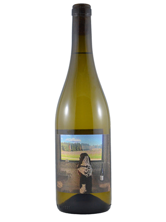Wine bottle with a label featuring a scenic view and a person.