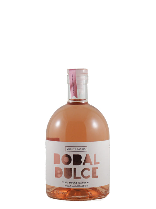 A bottle of Bobal Dulce rosé wine by Vicente Gando, featuring a white label with rose gold lettering and a pink foil seal on a white background.